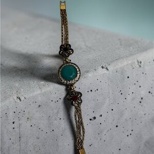 Gold-Tone Vintage Bracelet with Teal Center Stone and Crystal Halo